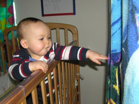 He can almost reach his curtain...