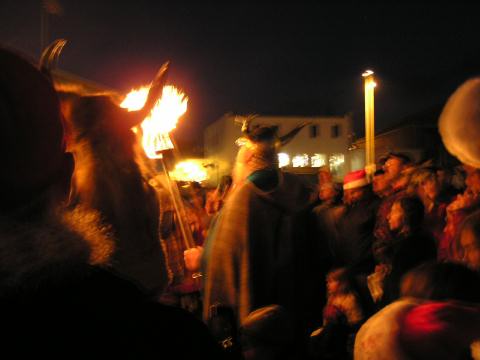 The Vikings lit the bonfire with their torches.