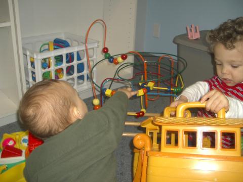 Sam playing at the gym daycare