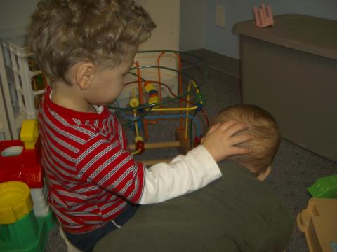 here he is palming Sam's head.