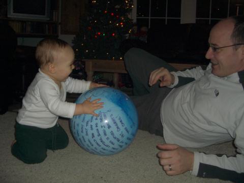 Learning to share the ball with daddy.