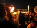 The Vikings lit the bonfire with their torches.