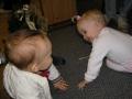 Sam flirting with a little girl at a Christmas party.