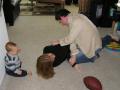 Alli and Doug wrestling...